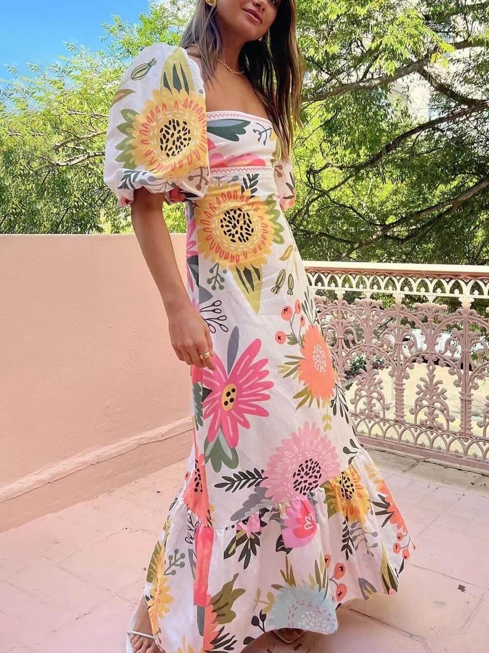 Maxi dress with square neckline, floral pattern, and puff sleeves